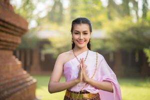 Beautiful Woman wearing typical Thai dress photo