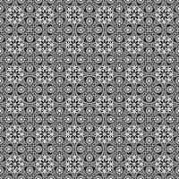 papel tapiz de mandala geométrico de fondo de patrón sin costuras de batik clásico. elegante motivo floral tradicional vector