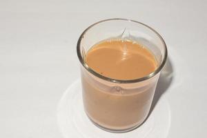 Chai. traditional indian tea on white background. photo