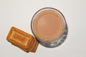 Morning breakfast concept. tea cup and Biscuit on white background. photo