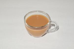 Chai. traditional indian tea on white background. photo