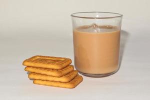Morning breakfast concept. tea cup and Biscuit on white background. photo