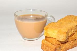 Rusk with cup of tea with white background. photo