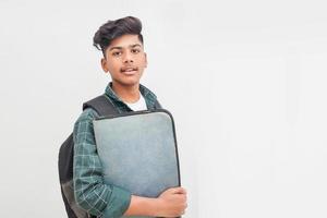 Young indian student holding file in hand. photo