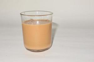 Chai. traditional indian tea on white background. photo
