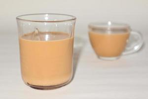 Chai. traditional indian tea on white background. photo