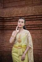 Beautiful Woman wearing typical Thai dress photo