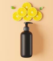 Pump bottle for cream or perfume on orange background. photo