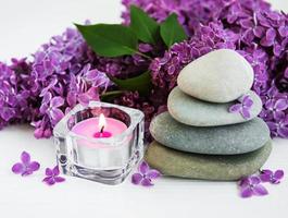 spa products and lilac flowers photo