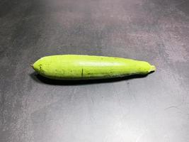 bottle gourd, Lagenaria siceraria isolated on black background. photo