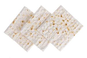 Background with crackers matzoh matzah, matzo isolated on white photo