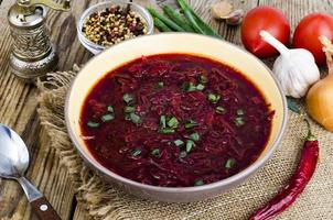 Veggie vegetable soup with red beet. photo