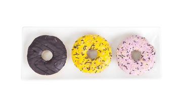 Sweet tasty donuts with colorful icing. photo