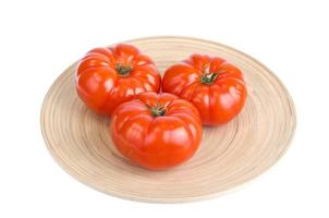 Three red ripe tomato beef. Studio Photo