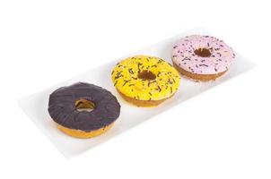 Sweet tasty donuts with colorful icing. photo