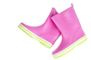 Children's pink rubber boots for walking. photo