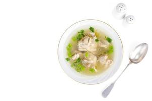 Broth with chicken meat Isolated on White background photo