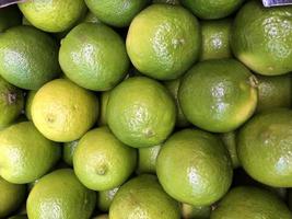 Macro photo green fresh limes.Stock photo citrus fruit green lime