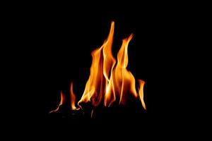 Fire flame texture. Burning material backdrop. Burn effect pattern. Blaze and torch wallpaper. Heat and haze backdrop. photo