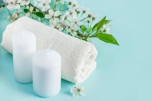 Spa and relaxation accessories on blue background. photo