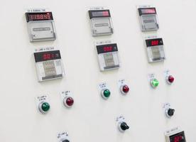 electrical control panel with indicator lights. closeup photo