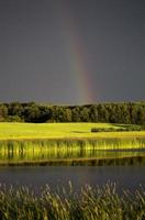 Storm Clouds Prairie Sky Rainbow photo