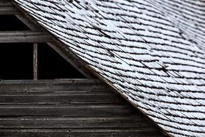 Roof on wooden barn photo