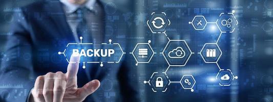 Backup Storage Data Technology concept. Businessman touching Backup photo