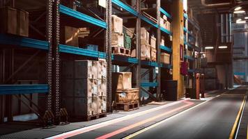 rows of shelves with boxes in warehouse photo