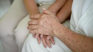 close up elderly people's holding hand