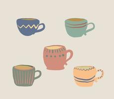 A set of cups. Cups with tea, coffee. Cups with a pattern are drawn in hand drawn style. Cups for tea drinking. vector