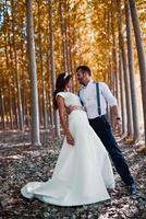 Just married couple in poplar background photo