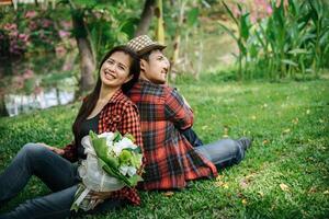 Couple joking in the park. photo