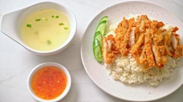 Hainanese chicken rice with fried chicken or rice steamed chicken soup with fried chicken - Asian food style video