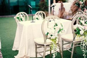 Wedding arch, wedding, wedding moment, wedding decorations, flowers, chairs, outdoor ceremony in the open air photo