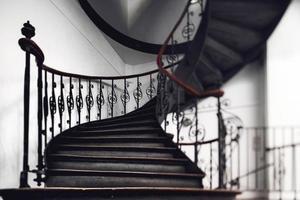 Antique vintage rounded staircase in old house, Strasbourg, France photo