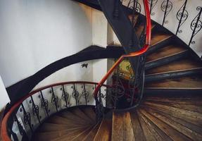 Antique vintage rounded staircase in old house, Strasbourg, France photo