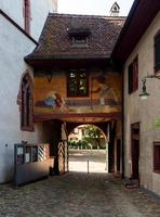 Calm narrow street, sunny summer day, cozy old downtown, Basel photo