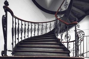 Antique vintage rounded staircase in old house, Strasbourg, France