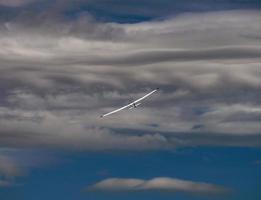 RC model of an airplane in the sky. Recreation and entertainment for children photo