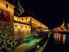 Colorful night street view of Styrasbourg. Highlighted buildings. Comfortable place. photo