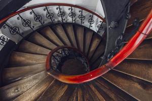 Antique vintage rounded staircase in old house, Strasbourg, France photo