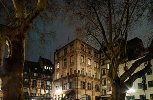 Old alleys of the historic center of Strasbtsrg at night. Fog. photo