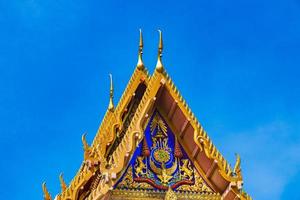 Colorful Wat Don Mueang Phra Arramluang buddhist temple Bangkok Thailand. photo