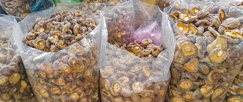 Dried packed mushrooms market Thai food China Town Bangkok Thailand. photo