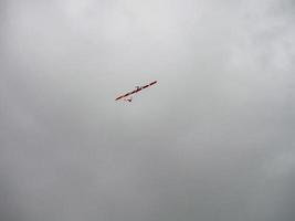 RC model of an airplane in the sky. Recreation and entertainment for children photo