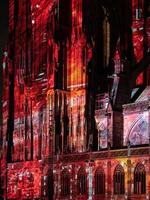 Laser lighting show on the walls of Cathedral Notre Dame de Strasbourg photo