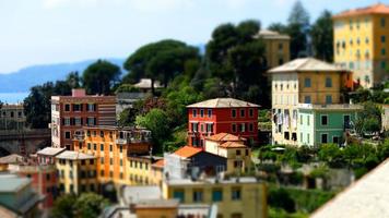 Bright and colorful Italian cityscape. Sunlit streets. Colorful houses. Warm and comfortable. photo