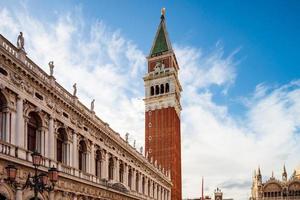 St. Mark's Square in Venice. Tall bell tower on a sunny day. photo