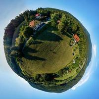 Abstract image of a small planet. Taken from the drone. Circular panorama. photo